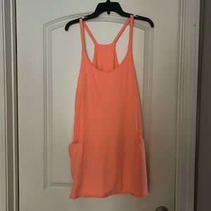 Free People Movement Hot Shot mini dress size Medium color orange Like new.